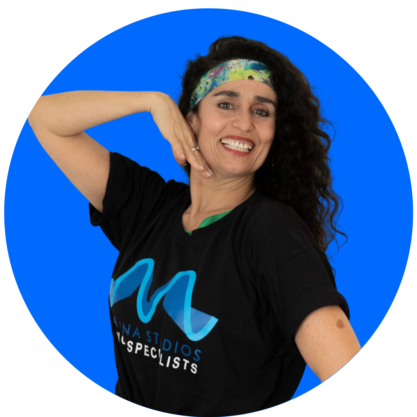 Dancer laughing mid-movement during a class at Marina Studios